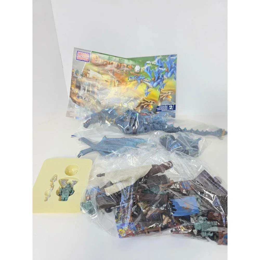 Large Mega Bloks lot Dragons Man o War pieces + challenge game pieces manuals